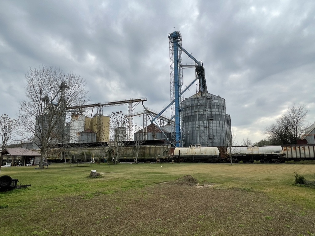 Nearby rail and grain facility view