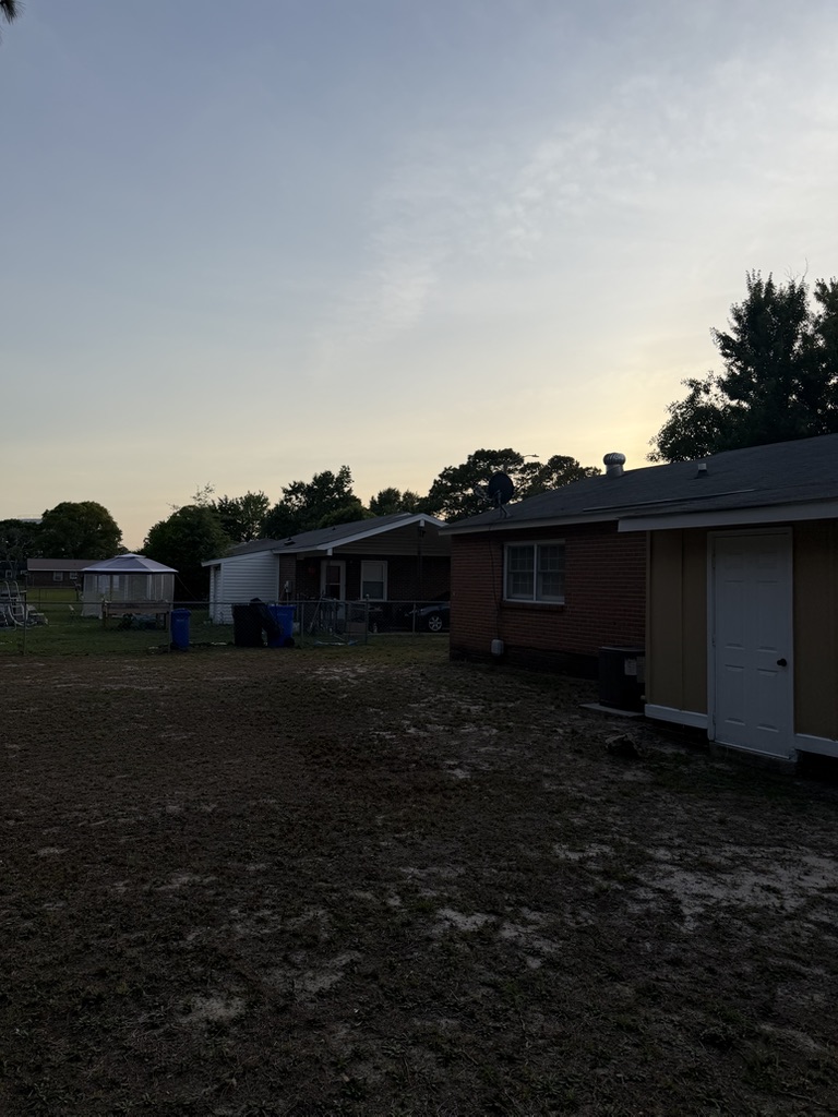 921 Fiske Drive backyard and rear view